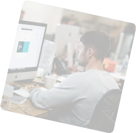 Young professional man working at desk