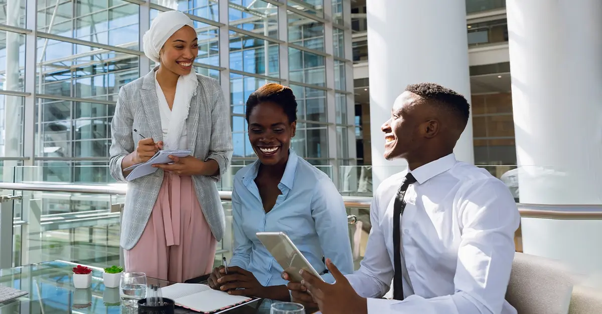 Business professionals collaborating during a meeting in a modern office.
