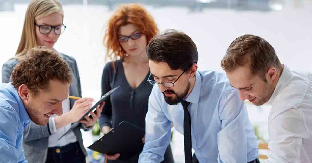 Group of colleagues in a meeting, discussing and collaborating