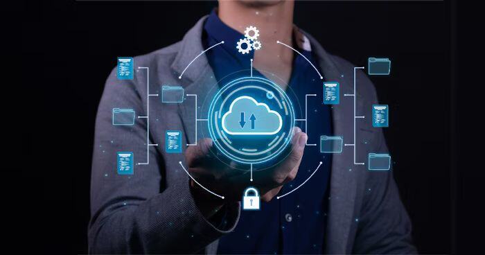 Person holding a digital cloud computing icon with data storage and security graphics.